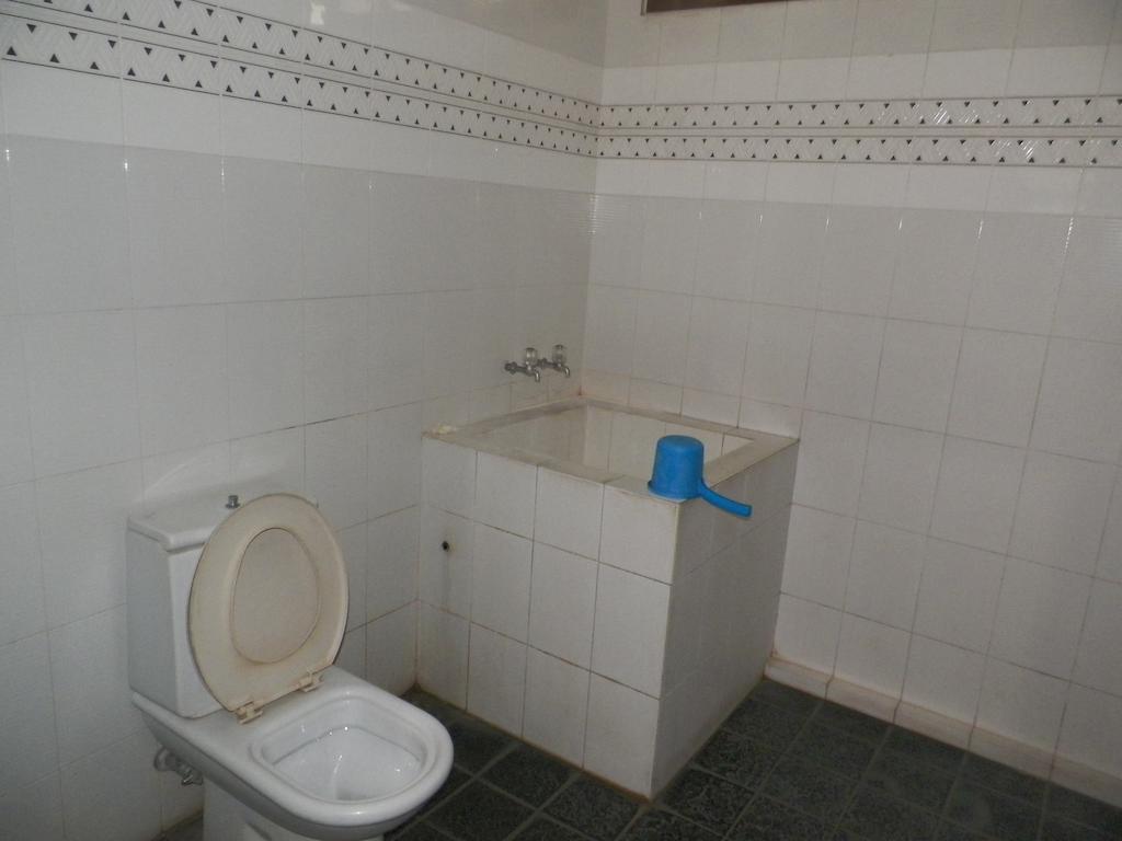 Rumah Utama Guest House Γιογκιακάρτα Δωμάτιο φωτογραφία