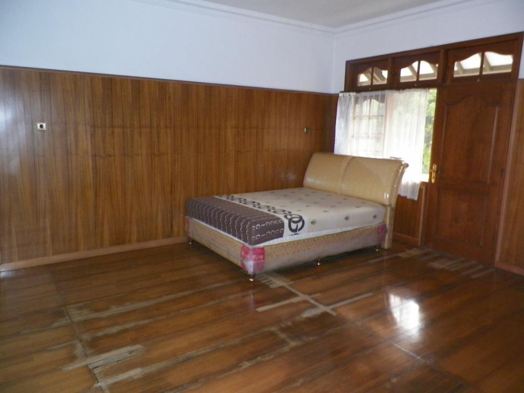 Rumah Utama Guest House Γιογκιακάρτα Δωμάτιο φωτογραφία